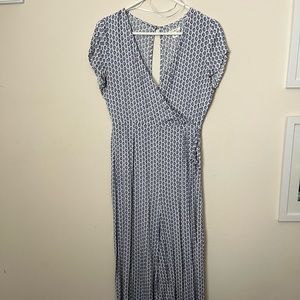 Francesca’s Blue And White Floral Jumpsuit Size Small
